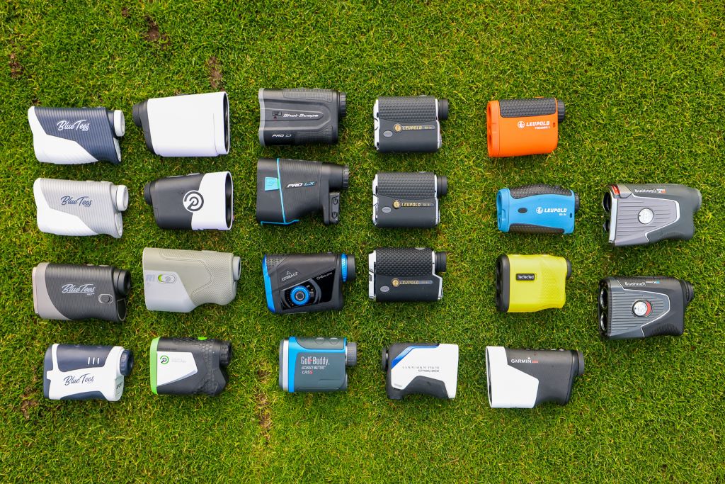 Close-up of golf rangefinder showing yardage on a fairway